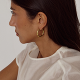 Rhode Huggie Earrings | 18K Gold
