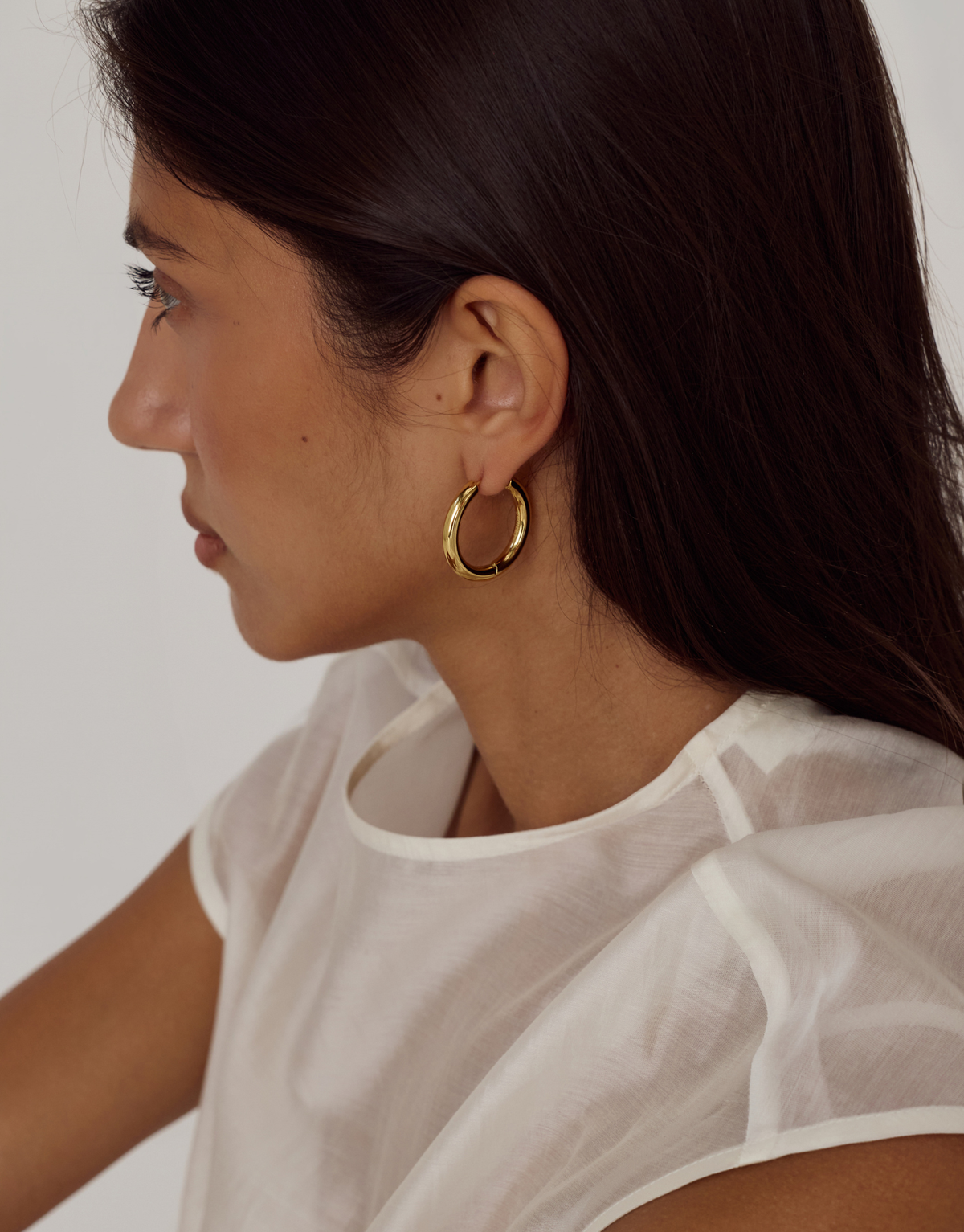 Rhode Huggie Earrings | 18K Gold